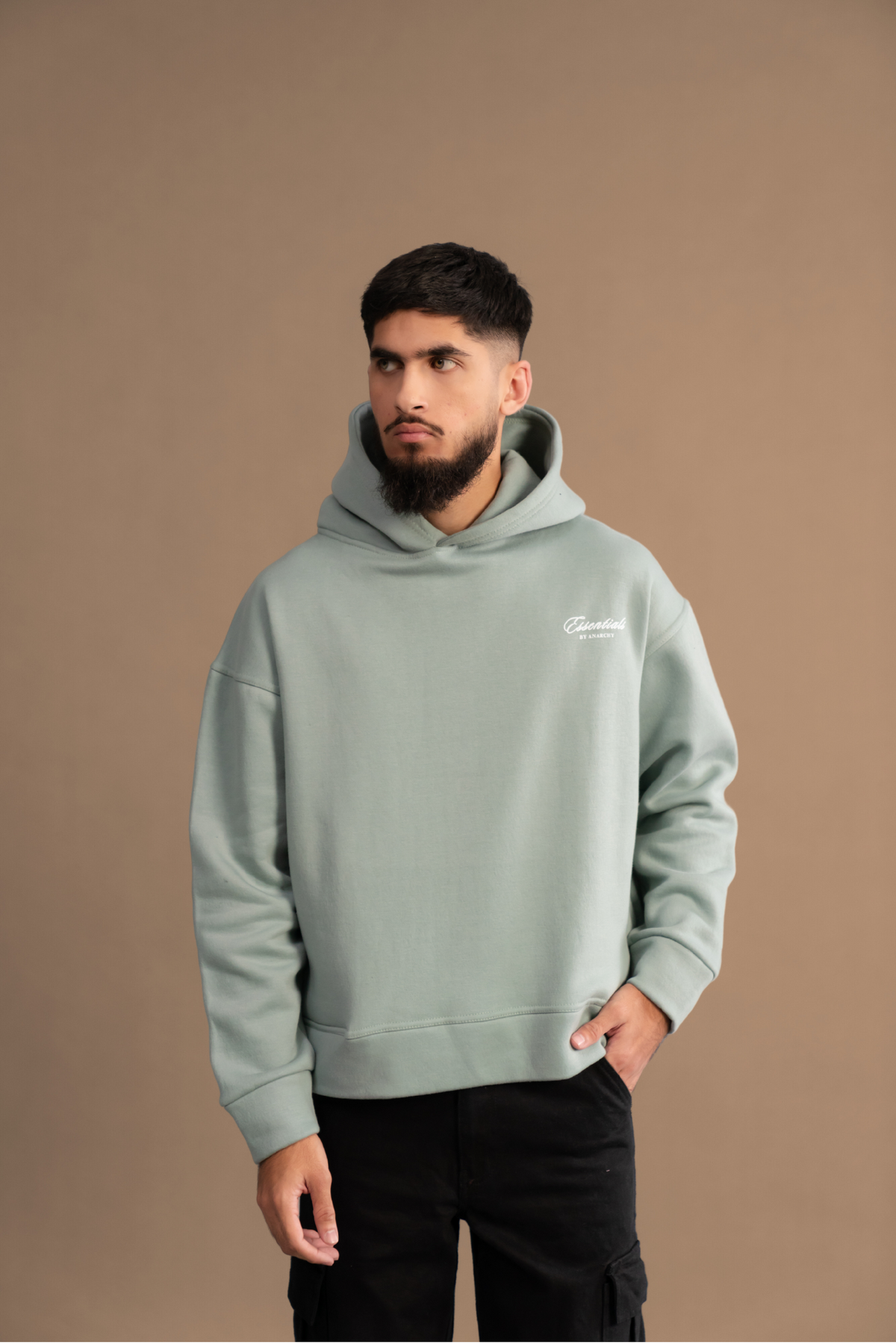 Wear Anarchy Aqua Green Essential Hoodie for men with relaxed fit, long sleeves, hood and embroidered chest logo