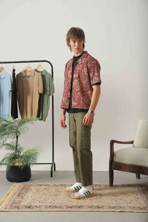 Wear Anarchy bandana print resort shirt for men styled with olive cargo trousers and casual sneakers