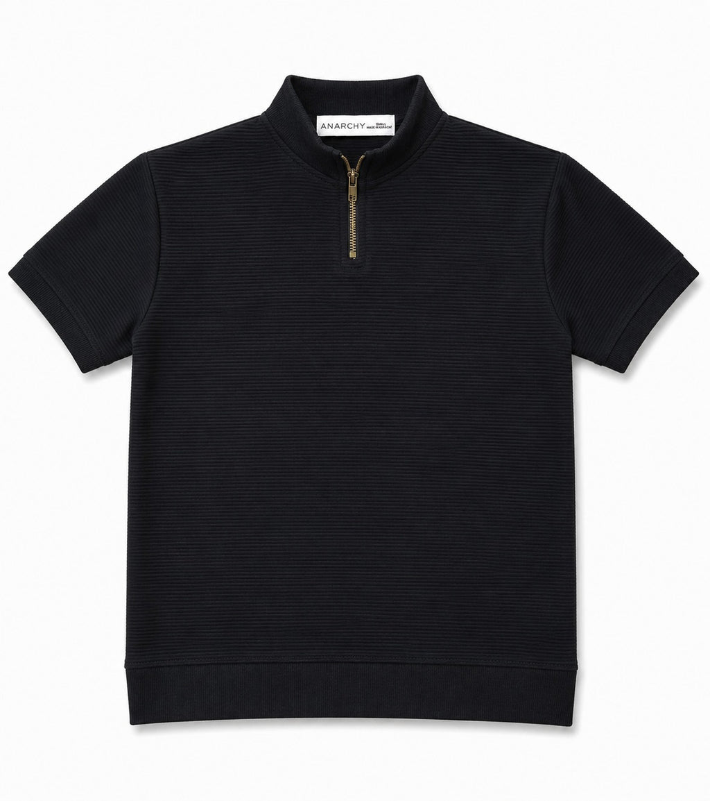 Wear Anarchy black textured quarter-zip polo shirt for men with short sleeves, mock neck and ribbed hem front view