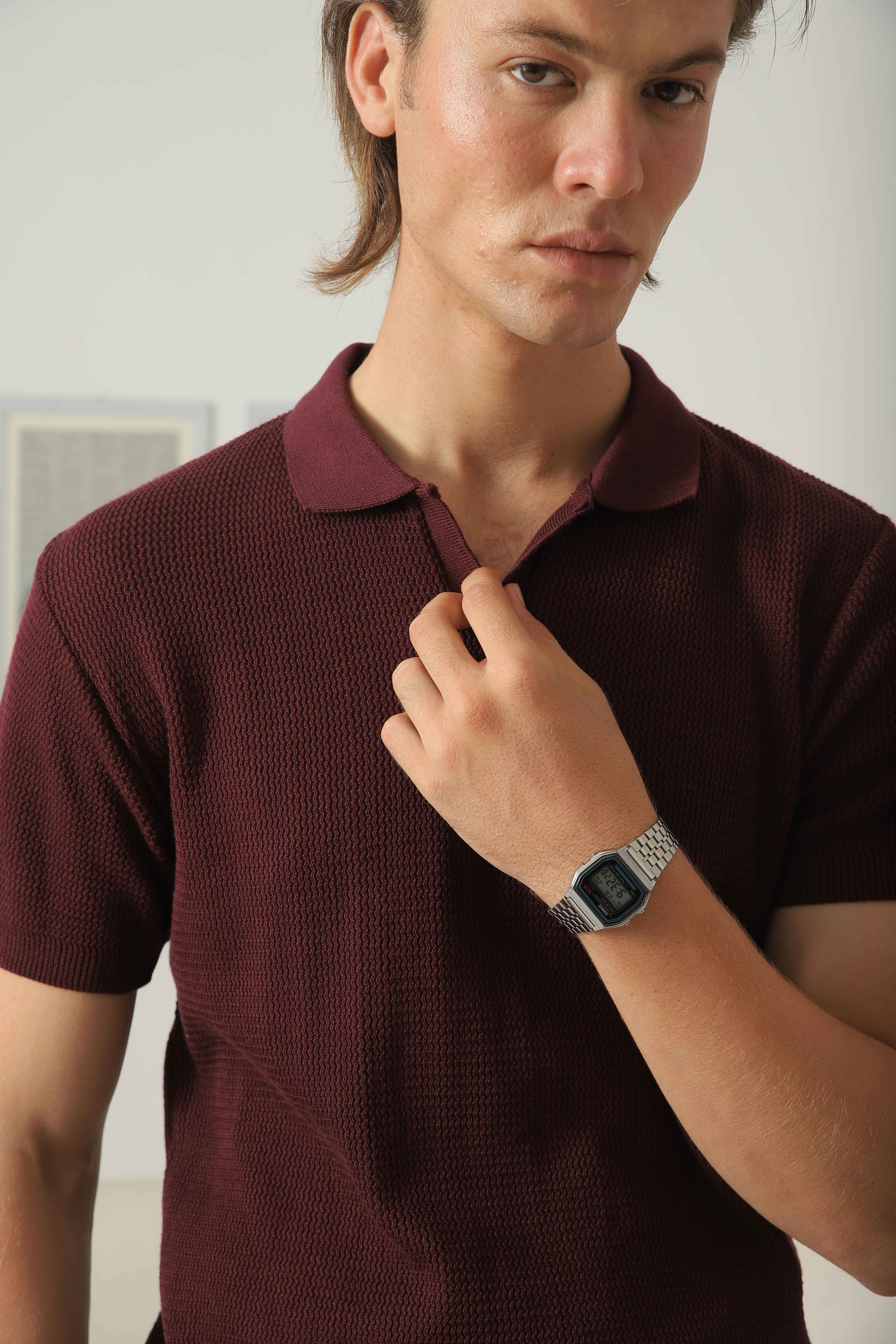 Close-up of Wear Anarchy burgundy knitted polo shirt for men showing textured knit fabric and open collar