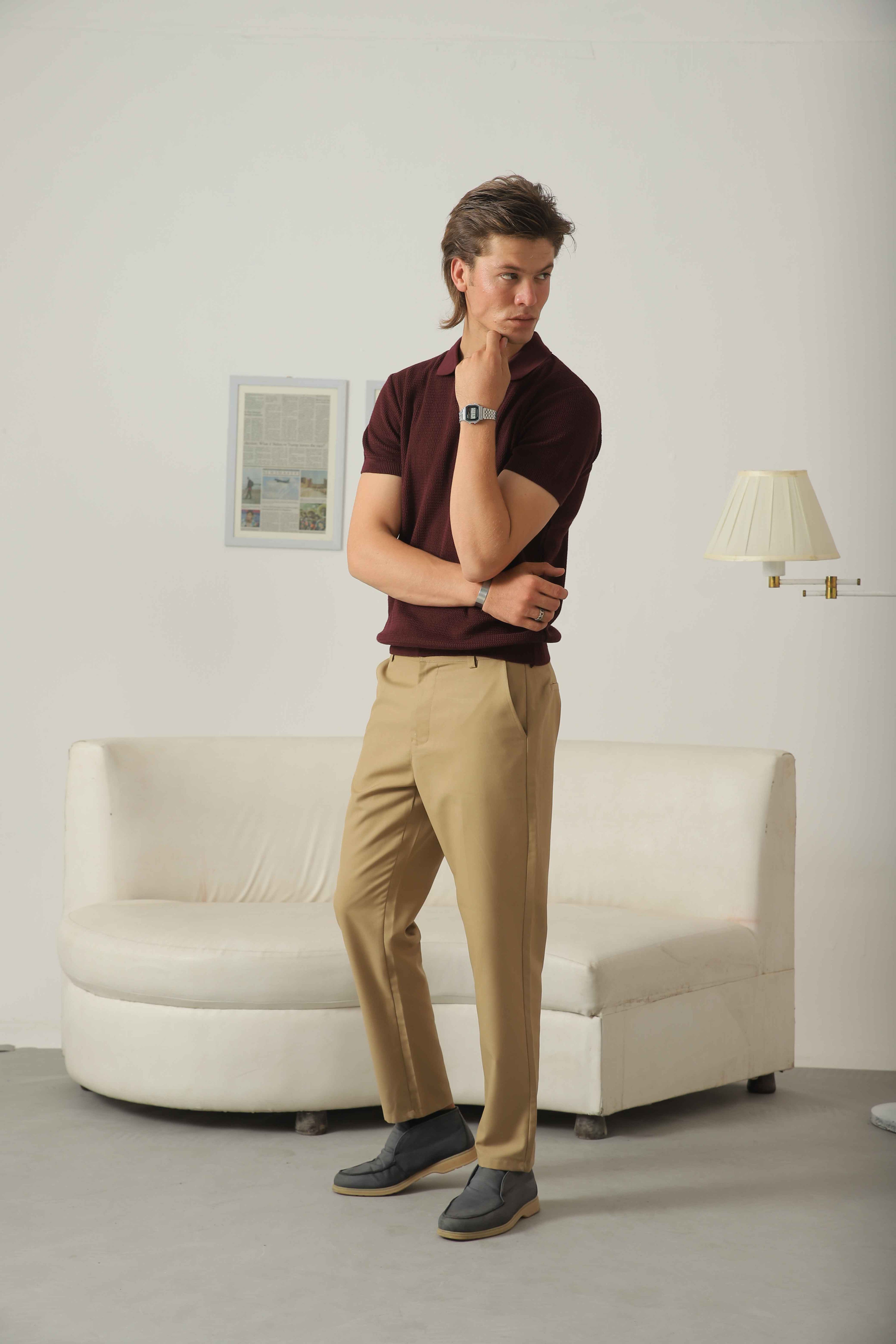 Wear Anarchy burgundy knitted polo shirt for men styled with beige trousers and casual loafers