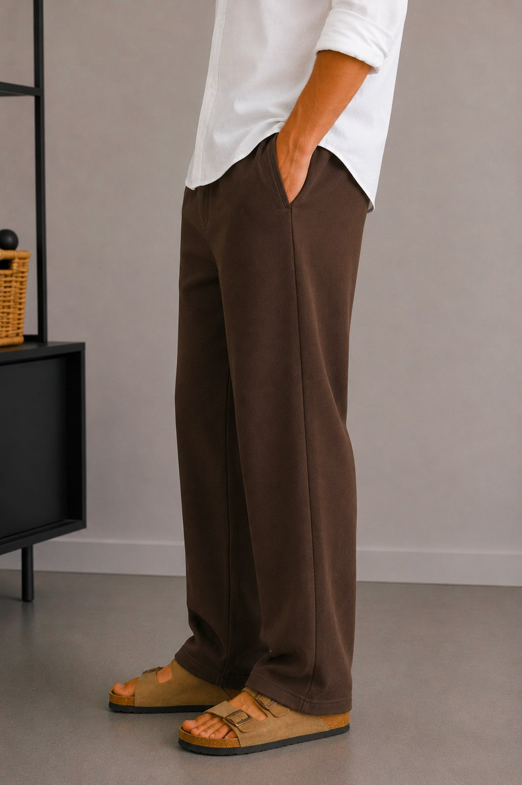 Side view of Wear Anarchy chocolate brown terry trousers for men with a relaxed straight-leg fit