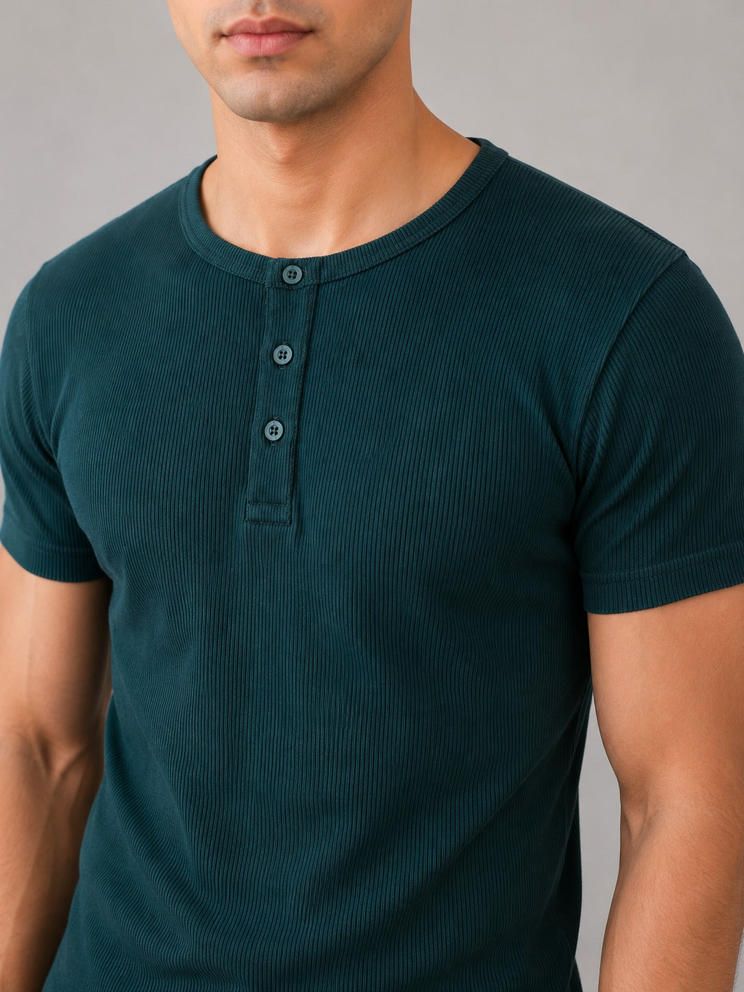 Close-up of Wear Anarchy deep green ribbed Henley shirt for men with short sleeves and three-button placket
