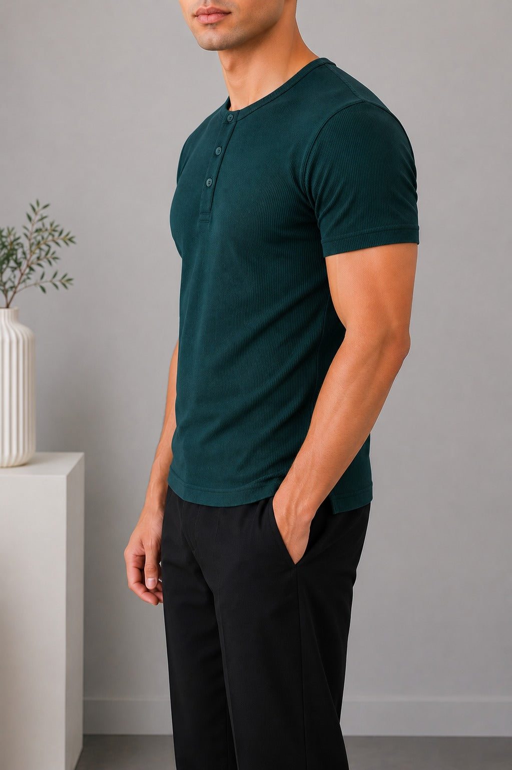 Side view of Wear Anarchy deep green ribbed Henley shirt for men with short sleeves and three-button placket