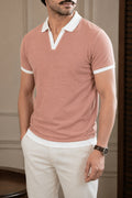 Side view of Wear Anarchy dusty pink polo shirt for men with white contrast collar and sleeve trim