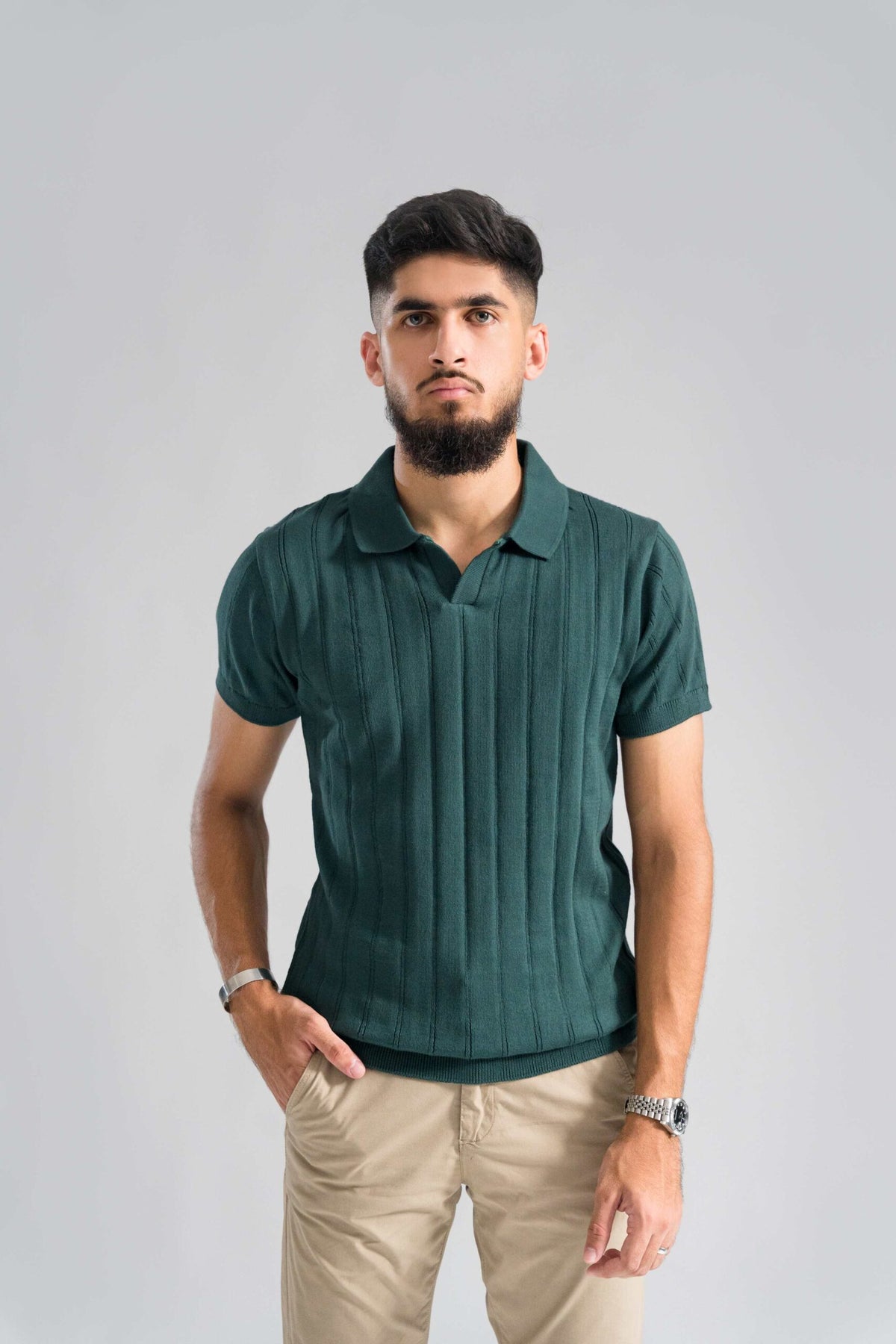 Wear Anarchy Forest Green Knitted Polo for men with textured vertical knit pattern, short sleeves and open collar