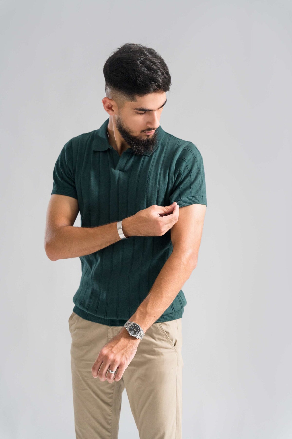 Wear Anarchy Forest Green Knitted Polo for men showing short sleeve fit and textured knit pattern