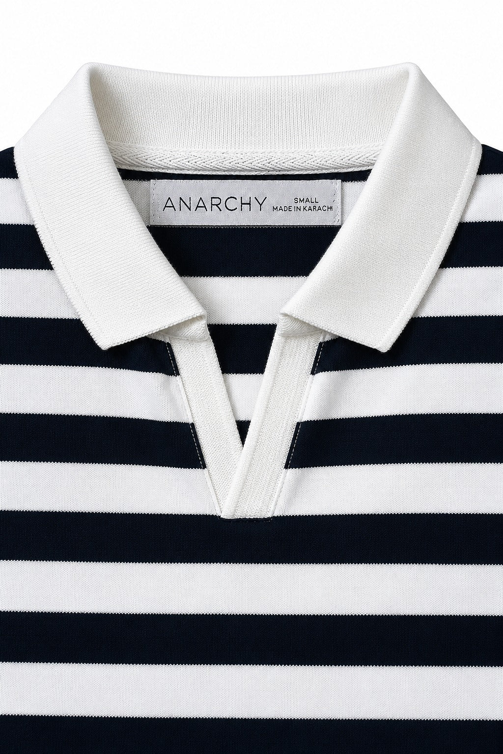 Close-up of Wear Anarchy navy and white striped polo shirt with white contrast collar and V-neck placket