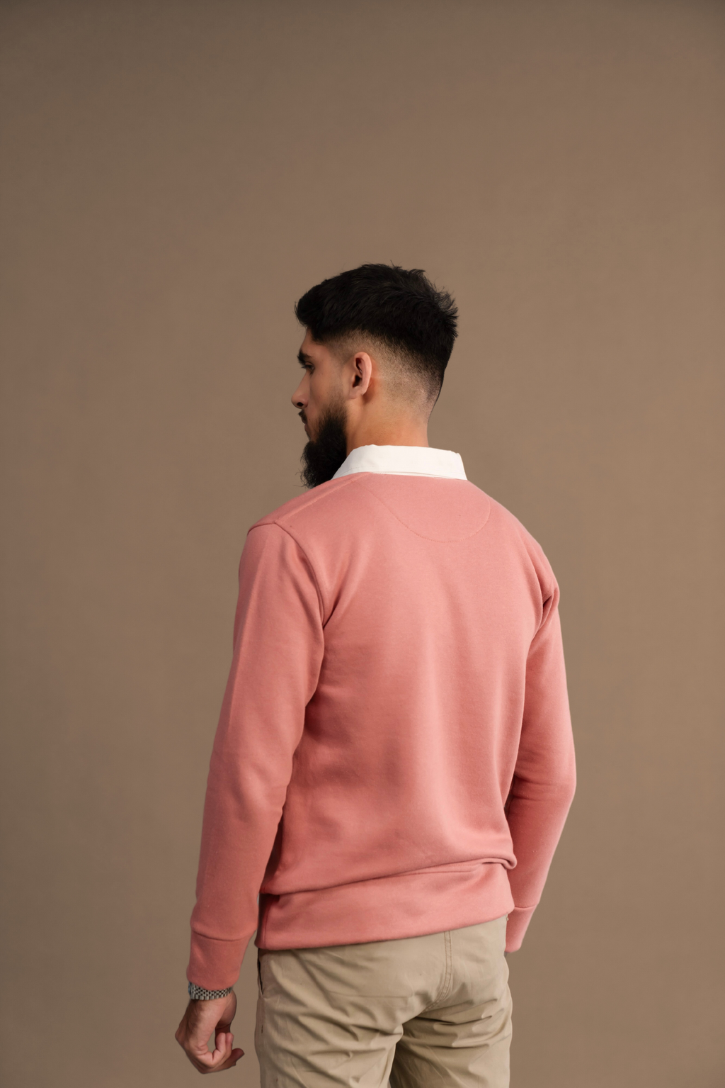 Back view of Wear Anarchy Pink Rugby Sweatshirt for men showing long sleeves and ribbed hem