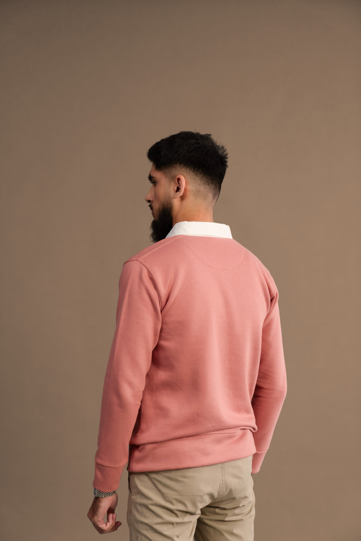Back view of Wear Anarchy Pink Rugby Sweatshirt for men showing long sleeves and ribbed hem