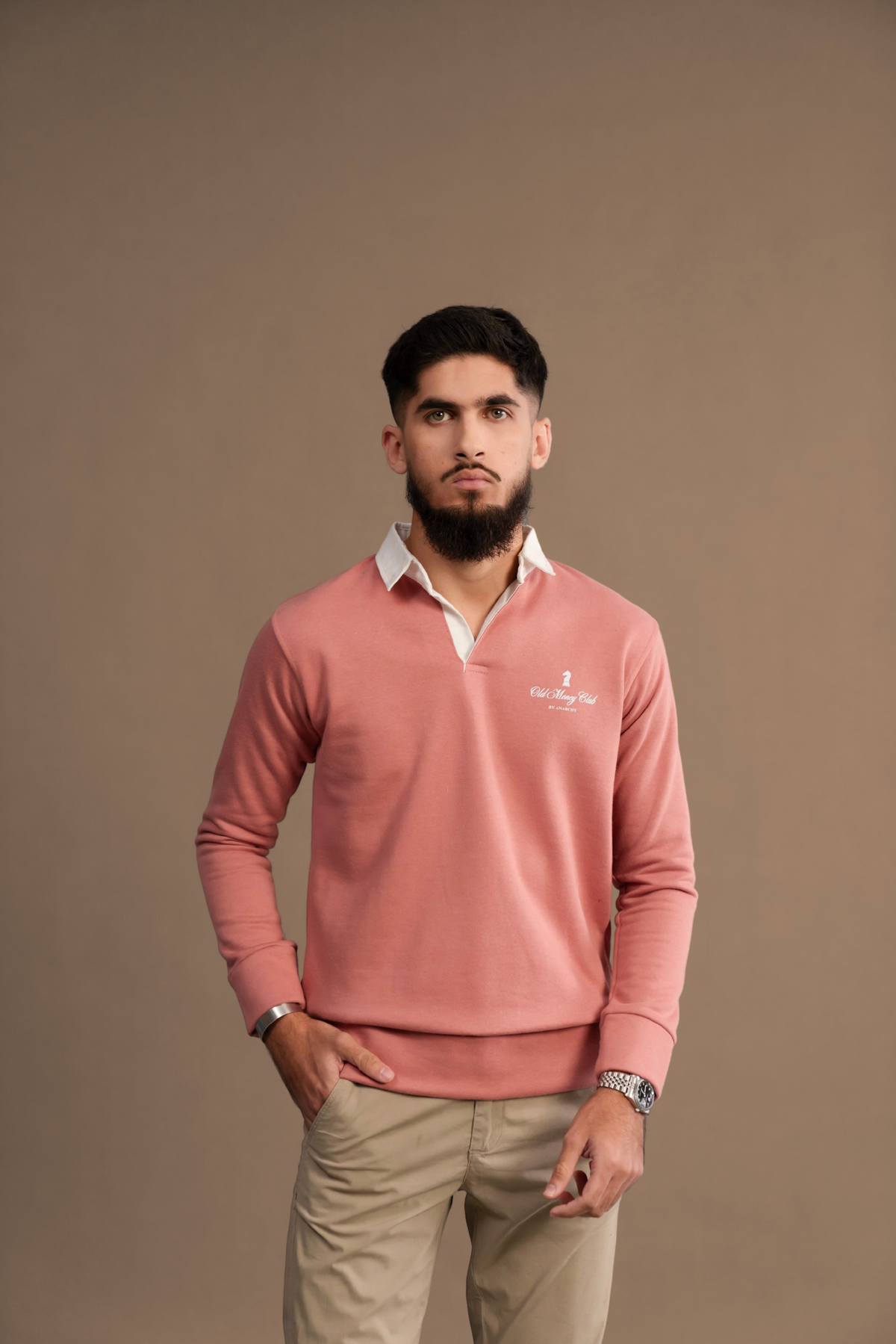 Front view of Wear Anarchy Pink Rugby Sweatshirt for men with white contrast collar and embroidered chest logo