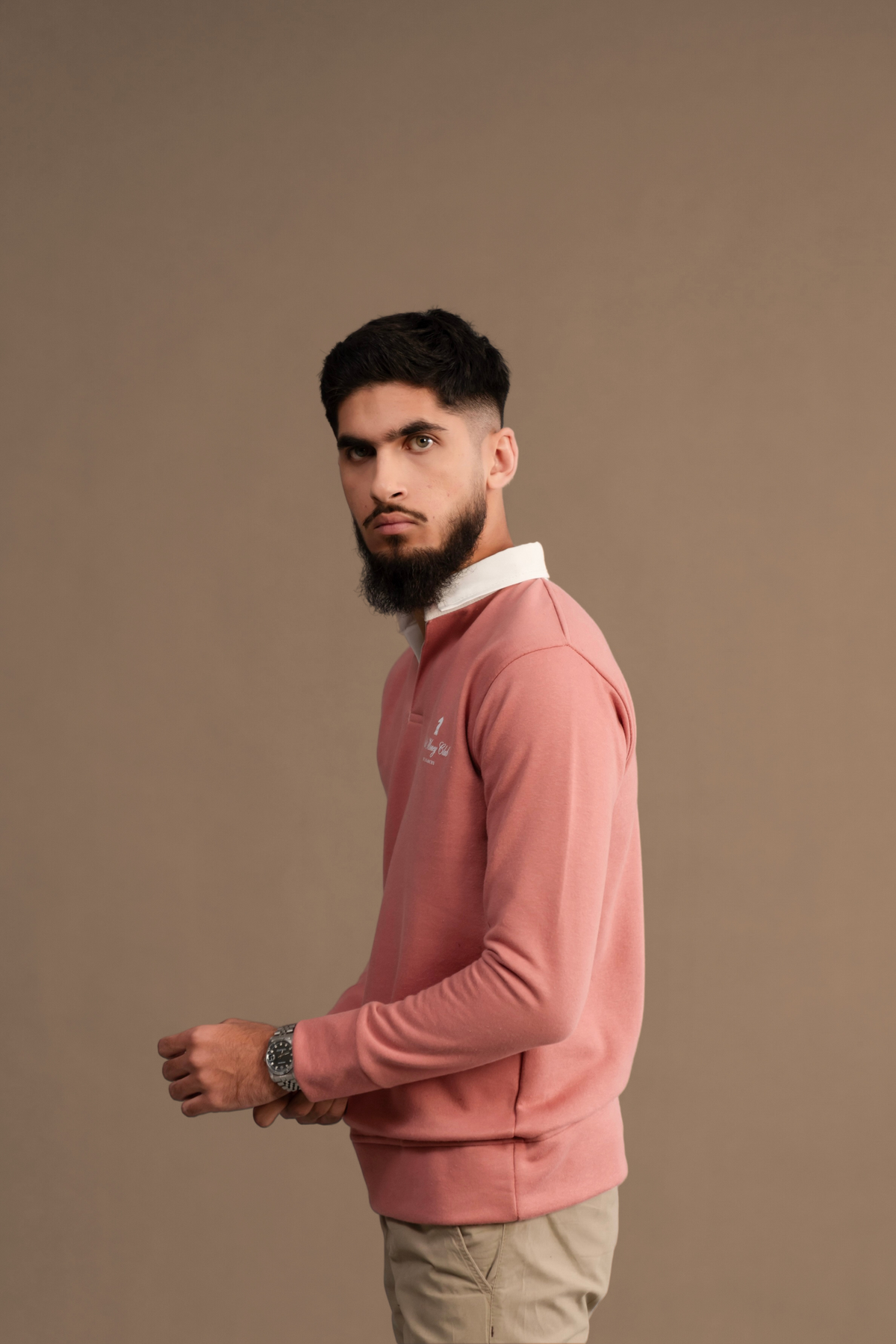 Side view of Wear Anarchy Pink Rugby Sweatshirt for men with white contrast collar and long sleeves