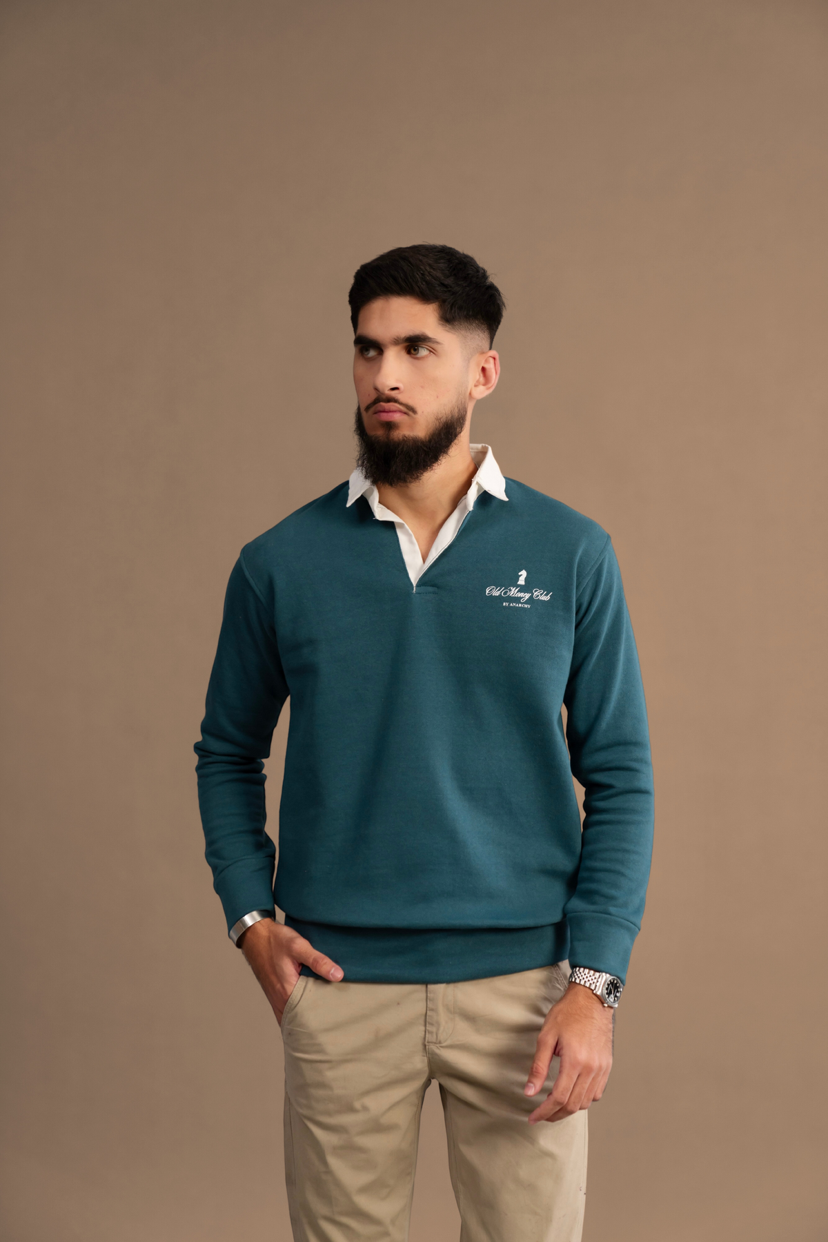 Wear Anarchy Teal Rugby Sweatshirt for men in a casual front look with white collar and embroidered chest detail