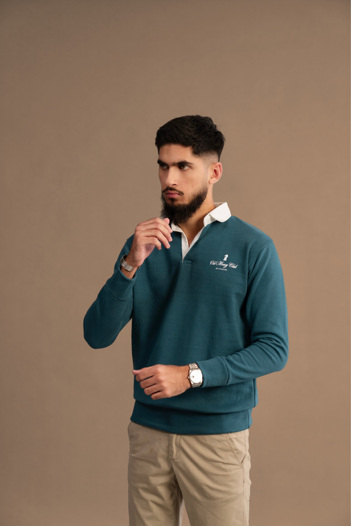 Wear Anarchy Teal Rugby Sweatshirt for men with white contrast collar, long sleeves and embroidered chest detail